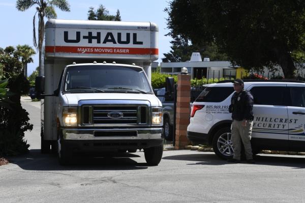 The trucks were spotted outside Costner's home in Carpinteria, Calif.