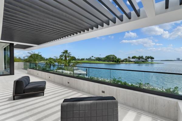 The Bay Harbor home comes with 80 feet on Biscayne Bay