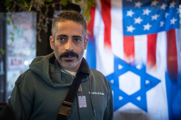 Maor o<em></em>nono poses at Hummus Kitchen, the Upper East Side eatery he co-owns with Sharon Hoota.