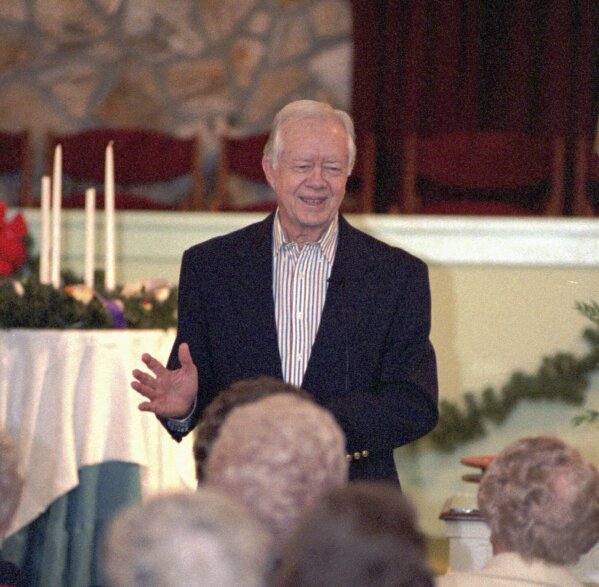 Former President Jimmy Carter teaches Sunday School at Maranatha Baptist Church in his hometown of Plains, Ga., Sunday, December 14, 1997. Carter says he thinks he has taught a<em></em>bout 1,600 Sunday school lessons. (AP Photo/Todd Stone)