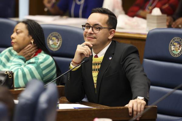 Cook County Commissio<em></em>ner Anthony Quezada listens to a discussion of his proposal to expand the county's requirements for paid time off, during the Cook County Board meeting.