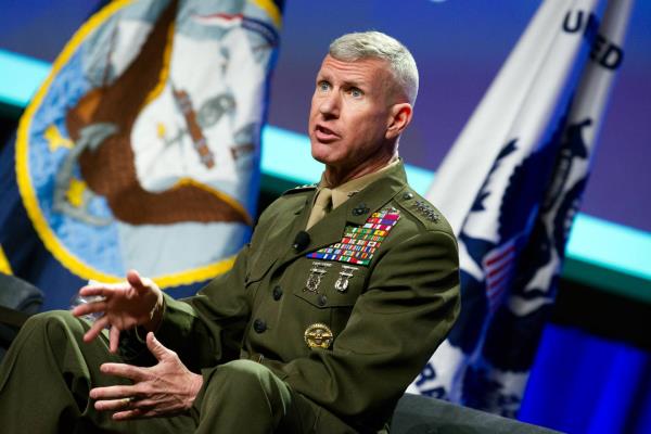 Assistant Commandant Of The Marine Corps Gen. Eric Smith gestures as he speaks o<em></em>nstage at the Sea-Air-Space co<em></em>nference in Natio<em></em>nal Harbor, Maryland, on April 4, 2023.